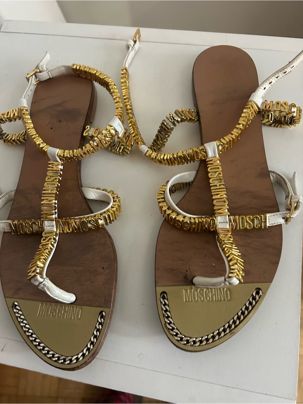 Moschino White Leather Gold Logo Chain Flat Sandals
